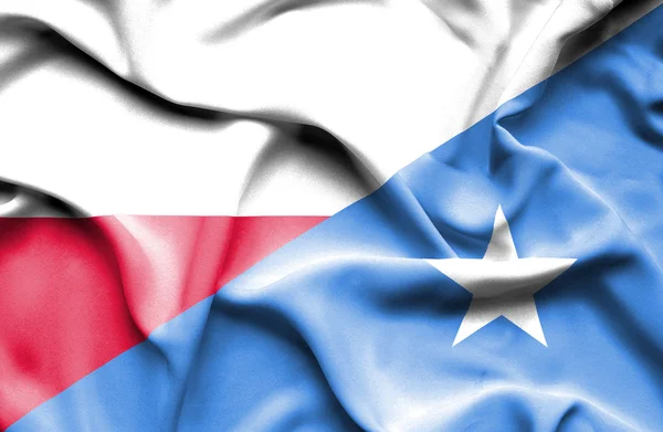 Wapperende vlag van Somalië en Polen — Stockfoto