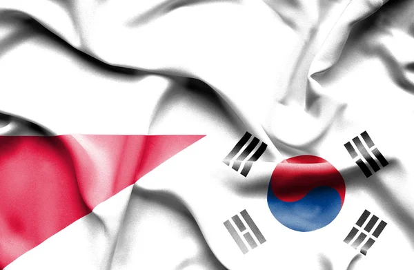 Waving flag of South Korea and Poland — Stock Photo, Image