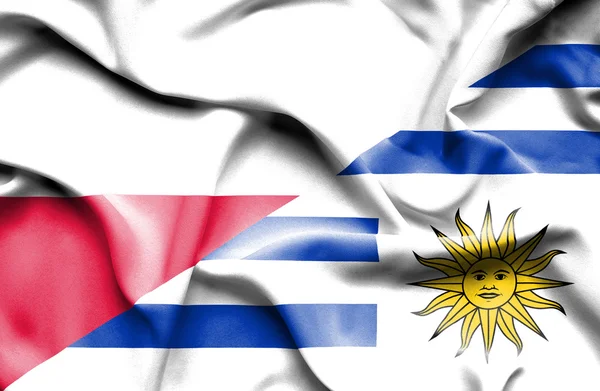 Bandera ondeante de Uruguay y Polonia —  Fotos de Stock