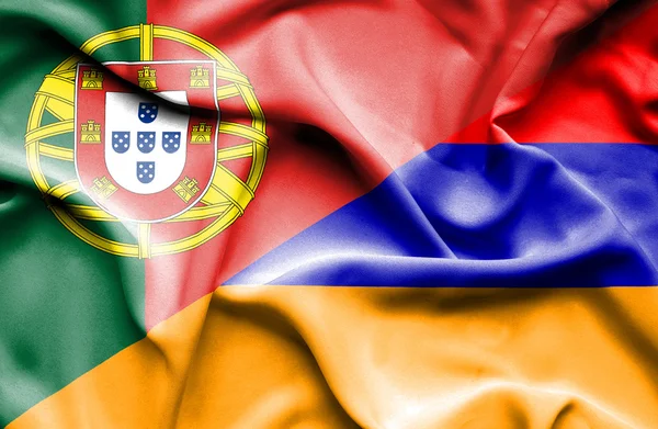 Viftande flagga Armenien och portugal — Stockfoto