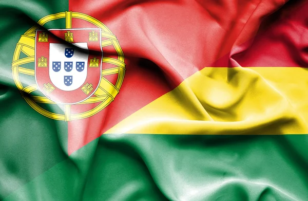 Waving flag of Bolivia and Portugal — Stock Photo, Image