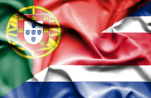 Drapeau agitant du Costa Rica et du Portugal — Photo