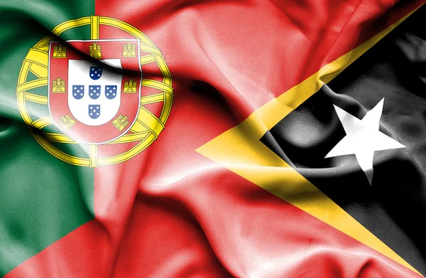 Östtimor och portugal viftande flagga — Stockfoto