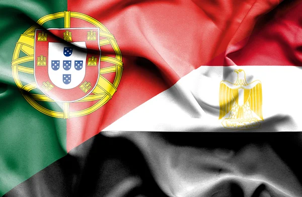 Waving flag of Egypt and Portugal — Stock Photo, Image