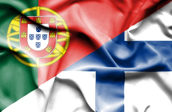 Portekiz ve Finlandiya bayrağı sallayarak — Stok fotoğraf