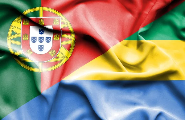 Viftande flagga gabon och portugal — Stockfoto