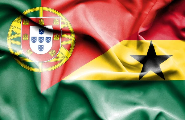 Wapperende vlag van ghana en portugal — Stockfoto