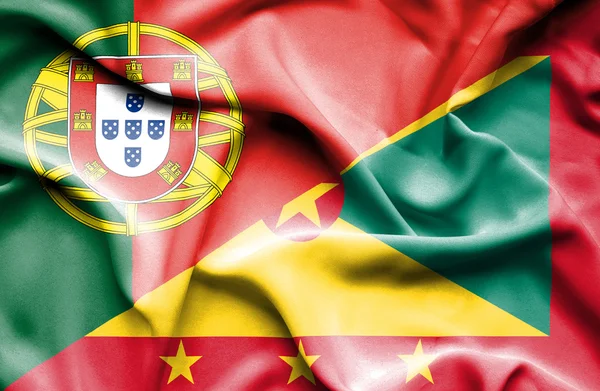 Viftande flagga guernsey och portugal — Stockfoto