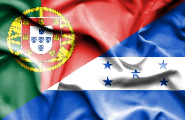 Mávání vlajkou Portugalska a Hondurasu — Stock fotografie