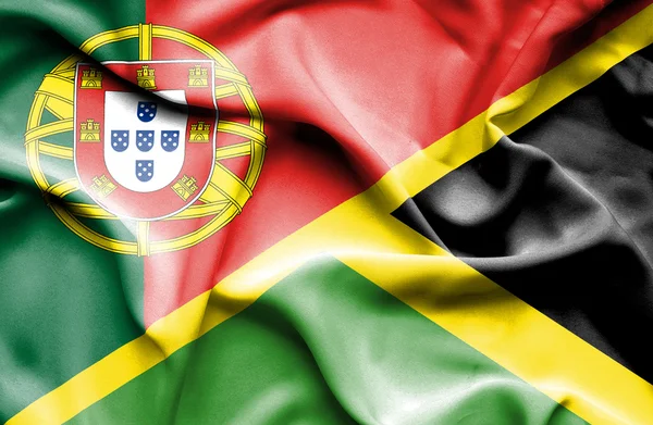 Wapperende vlag van jamaica en portugal — Stockfoto