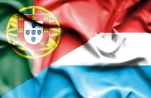 Bandera ondeante de Luxemburgo y Portugal —  Fotos de Stock