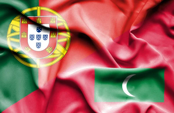 Waving flag of Maldives and Portugal — Stock Photo, Image
