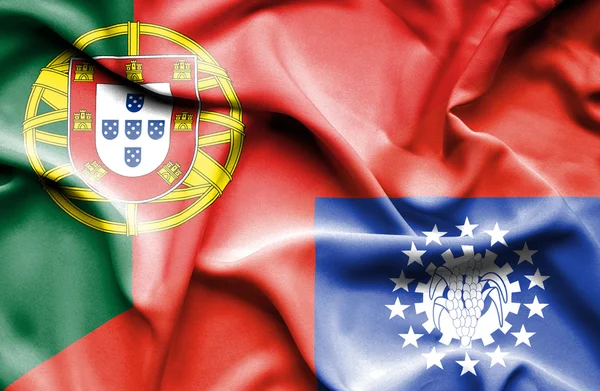 Wapperende vlag van myanmar en portugal — Stockfoto