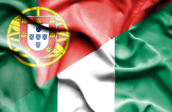 尼日利亚和葡萄牙那飘扬的旗帜 — 图库照片