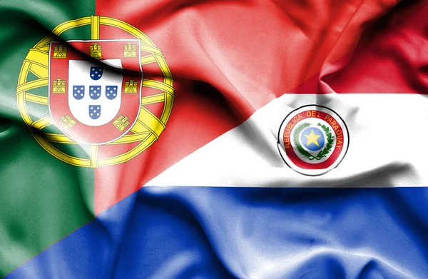 Paraguay och portugal viftande flagga — Stockfoto