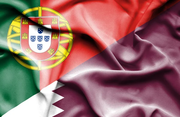 Qatar och portugal viftande flagga — Stockfoto