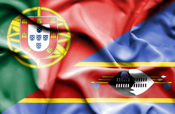 Flagge von Swasiland und Portugal schwenken — Stockfoto