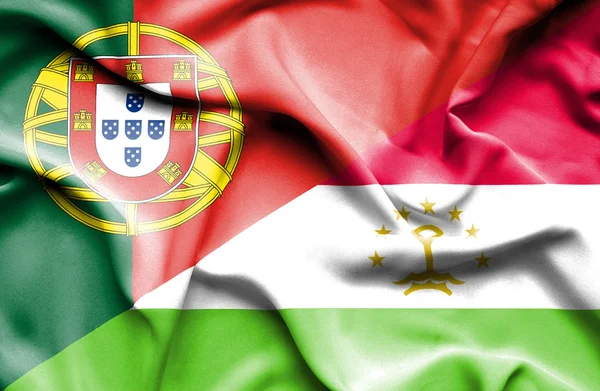 Waving flag of Tajikistan and Portugal — Stock Photo, Image