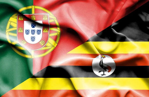 Wapperende vlag van Oeganda en portugal — Stockfoto