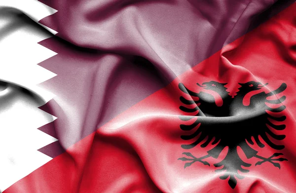 Bandera ondeante de Albania y Qatar —  Fotos de Stock