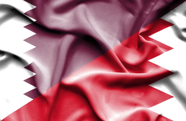 Waving flag of Bahrain and Qatar — Stock Photo, Image