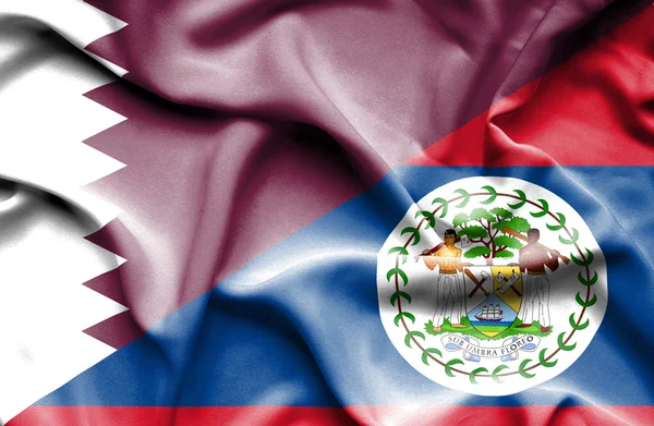 Waving flag of Belize and Qatar — Stock Photo, Image