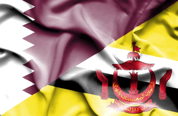 文莱和卡塔尔那飘扬的旗帜 — 图库照片