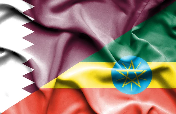 Waving flag of Ethiopia and Qatar — Stock Photo, Image