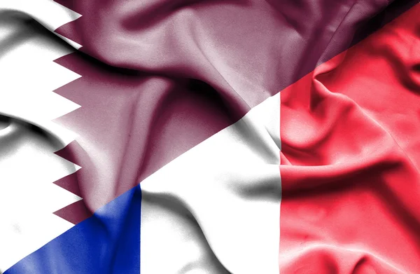 Ondeando la bandera de Francia y Qatar —  Fotos de Stock
