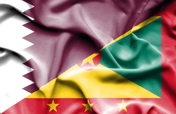 Waving flag of Guernsey and Qatar — Stock Photo, Image