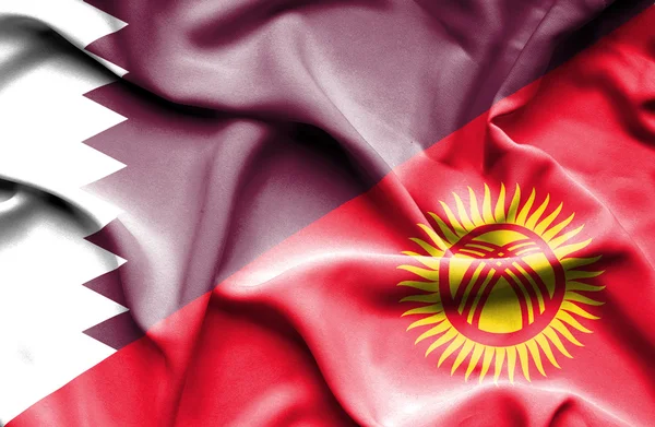 Waving flag of Kyrgyzstan and Qatar — Stock Photo, Image