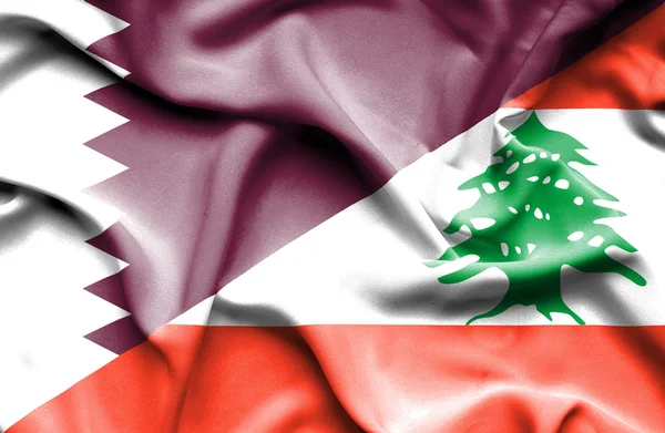 Wapperende vlag van Libanon en qatar — Stockfoto