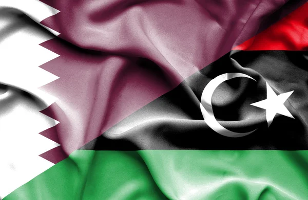 Libyen och qatar viftande flagga — Stockfoto