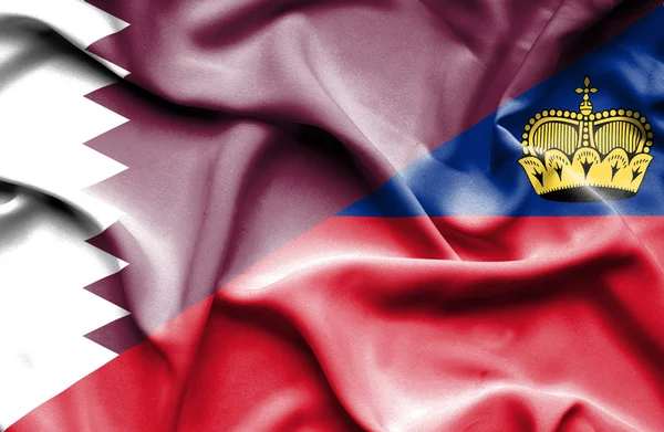 Lambaikan bendera Lichtenstein dan Qatar — Stok Foto