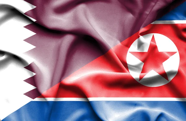 Bandeira acenando da Coreia do Norte e Qatar — Fotografia de Stock