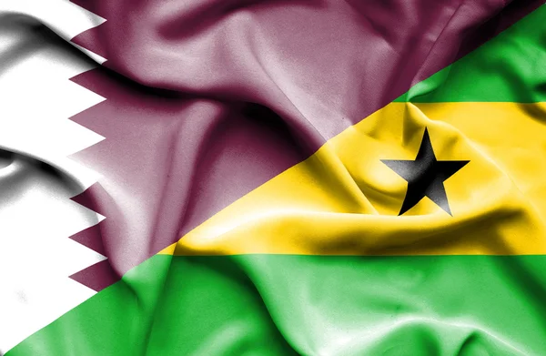 Sao tome och principe och qatar viftande flagga — Stockfoto