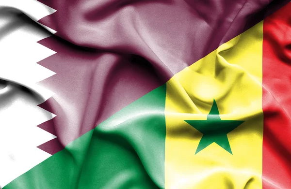 Ondeando la bandera de Senegal y Qatar —  Fotos de Stock