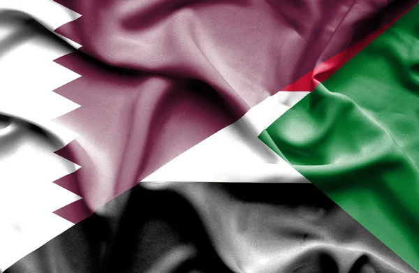 Machać flaga Sudanu i Katar — Zdjęcie stockowe