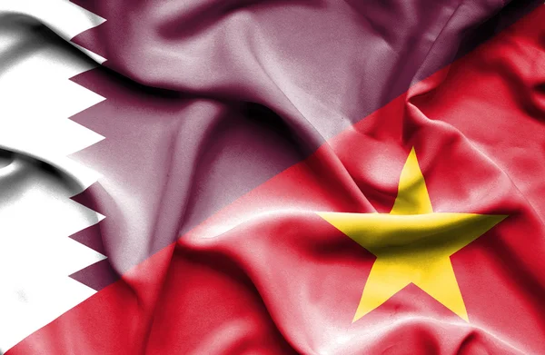 Ondeando la bandera de Vietnam y Qatar —  Fotos de Stock