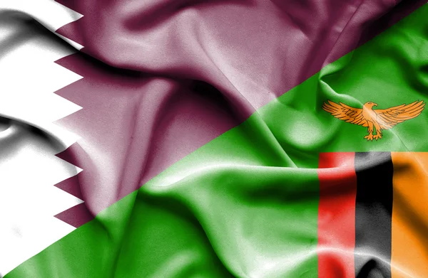 Zimbabve ve Katar bayrağı sallayarak — Stok fotoğraf