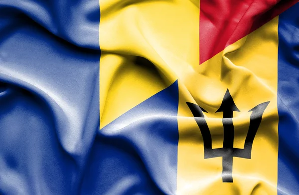 Wapperende vlag van barbados en Roemenië — Stockfoto