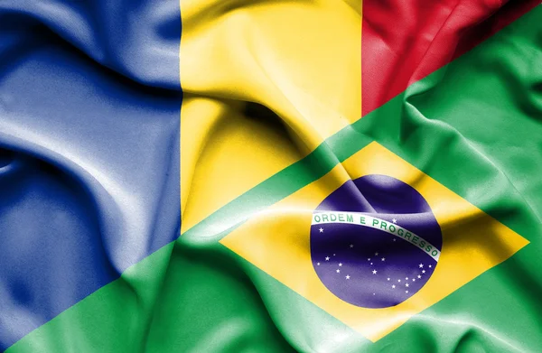 Waving flag of Brazil and Romania — Stock Photo, Image