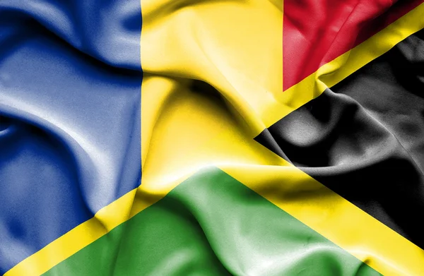 Waving flag of Jamaica and Romania — Stock Photo, Image