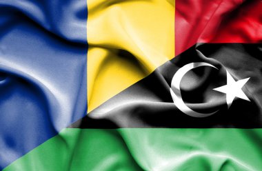 libya ve Romanya bayrağı sallayarak