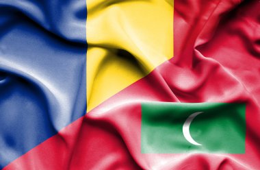 Maldivler ve Romanya bayrağı sallayarak