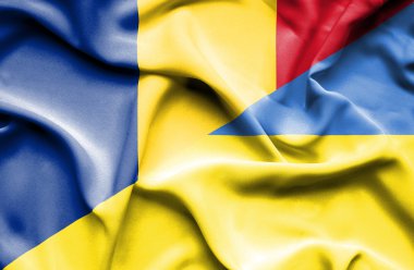 Ukrayna ve Romanya bayrağı sallayarak