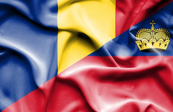 Wapperende vlag van lichtenstein en Roemenië — Stockfoto