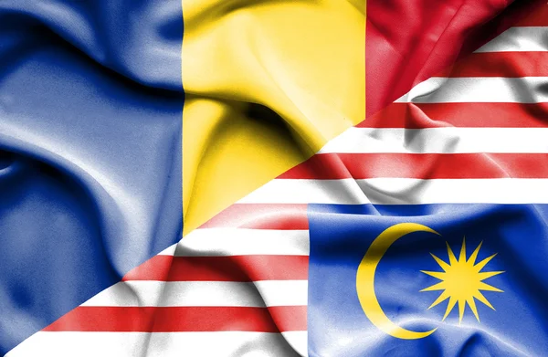 Waving flag of Malaysia and Romania — Stock Photo, Image