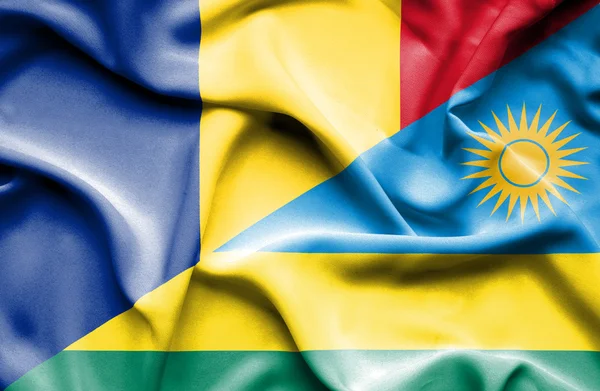 Flagge Ruandas und Rumäniens schwenken — Stockfoto