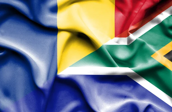 Waving flag of South Africa and Romania — Stock Photo, Image